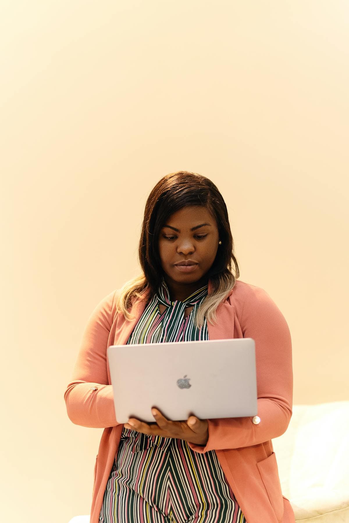 Professional working on a laptop during a client-facing session