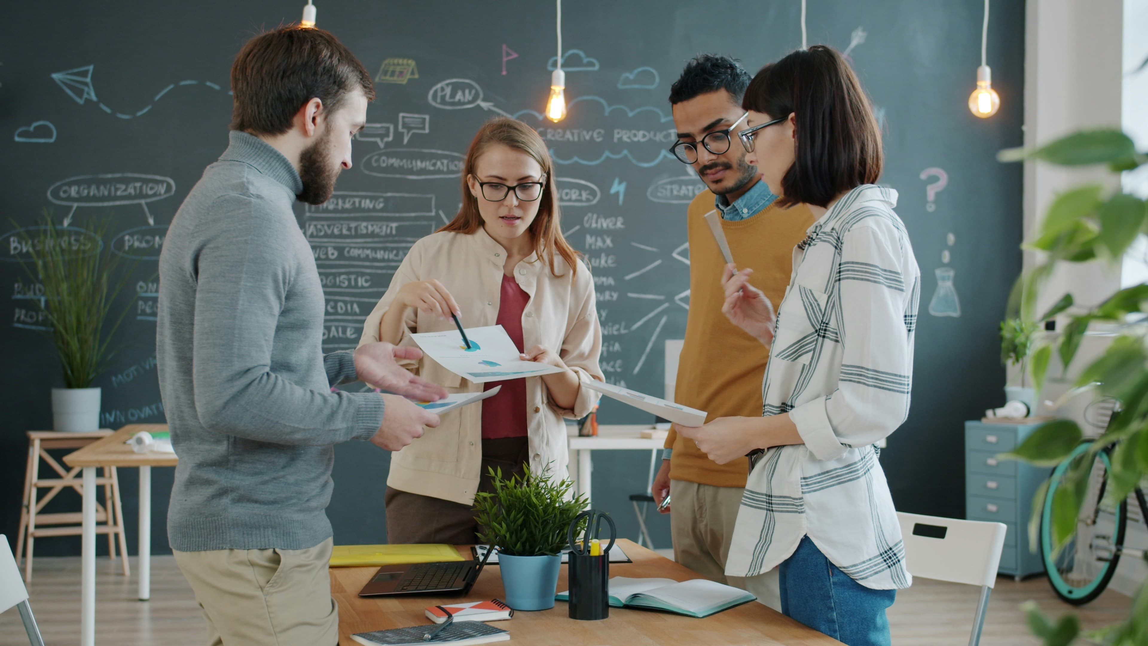 Creative team building content and campaign material together